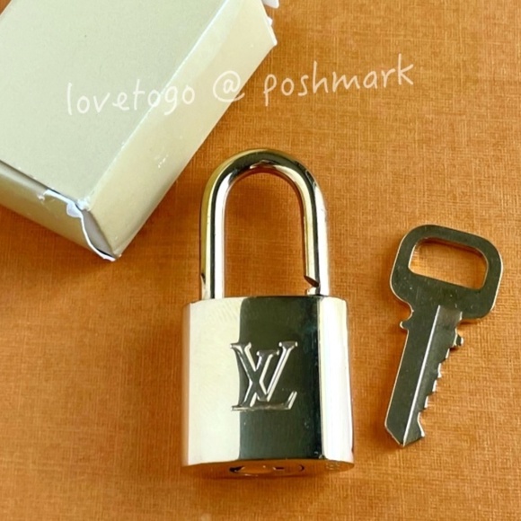Louis Vuitton Handbags - Authentic Louis Vuitton Lock & Key with original paper box